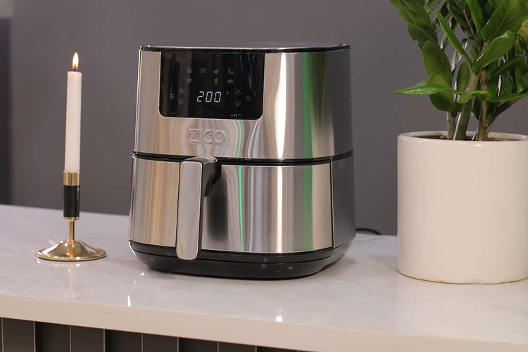 دستگاه ZC-9065 در حال کار، با نمایش دمای تنظیم شده